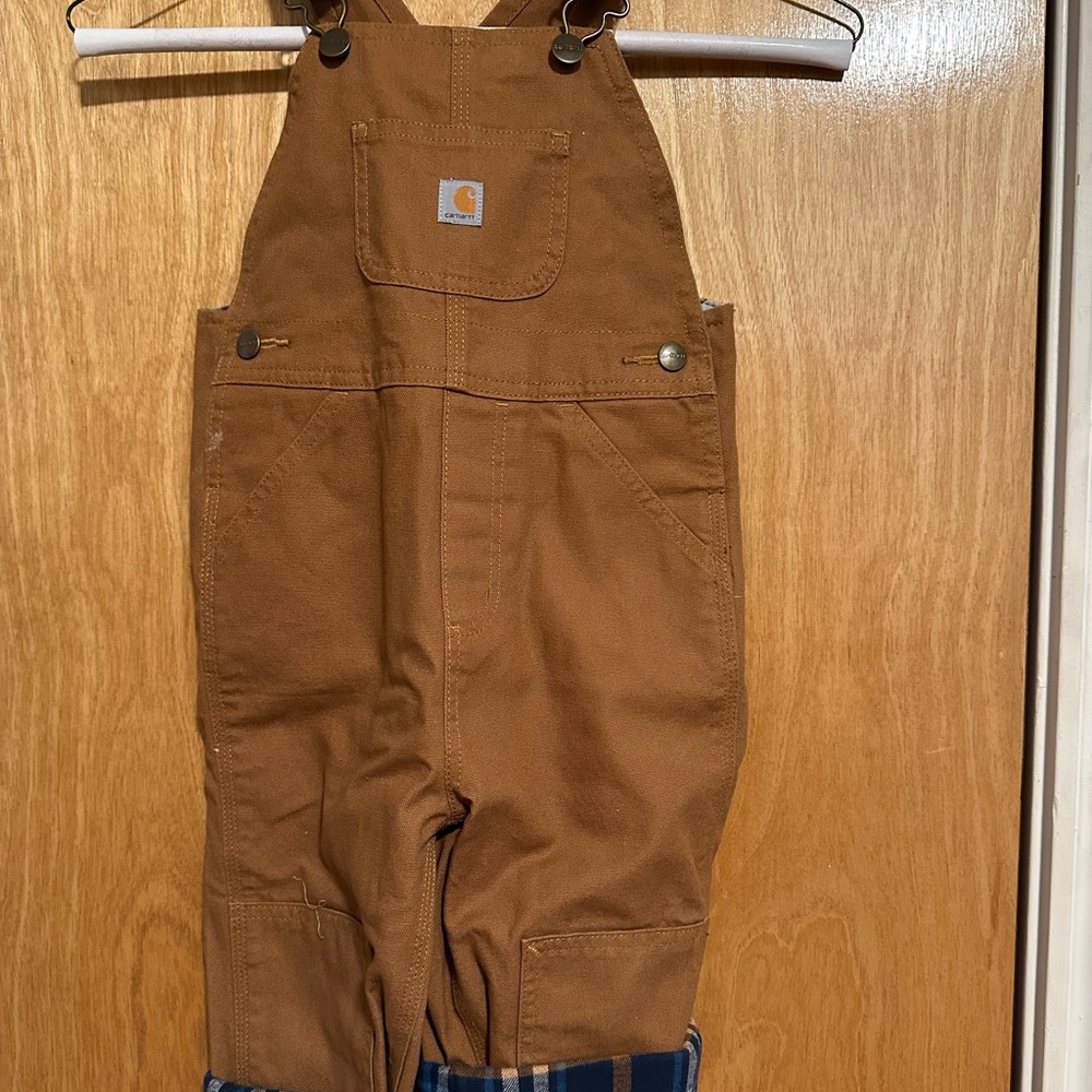 Kids flannel lined Carhartt overalls.